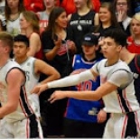 Boy's basketball players on court