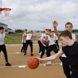 Boy's basketball players on court