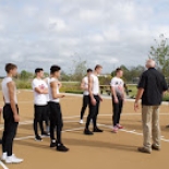 Boy's basketball players on court