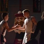 Boy's basketball players shaking hands