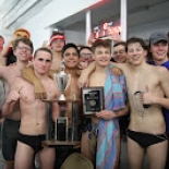 swim team members with their medals 