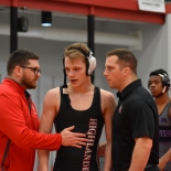 wrestler and coaches