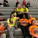 Girl's basketball players on bleachers