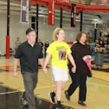 Girl's basketball player walking with family