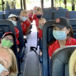 girls sitting on bus