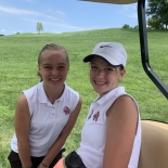 two girls smiling