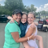 three girls smiling